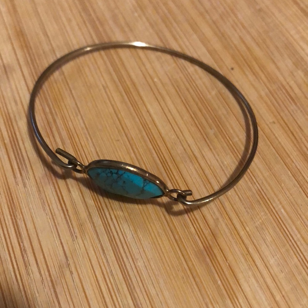 2” dia bracelet with blue stone design